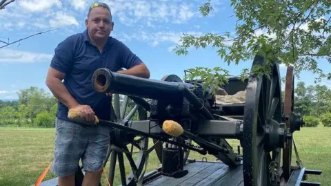 Mike Scheibe, a father of two and Civil War re-enactor, supported naming the school back to Stonewall Jackson High School