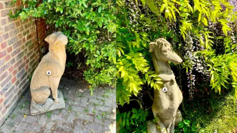 A gargoyle statue on the left and a deerhound statue on the right. Both are made out of concrete, and are pictured sitting outside the house near Esher Green from where they were stolen. 