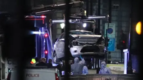 PA The car was moved from the scene on Tuesday night