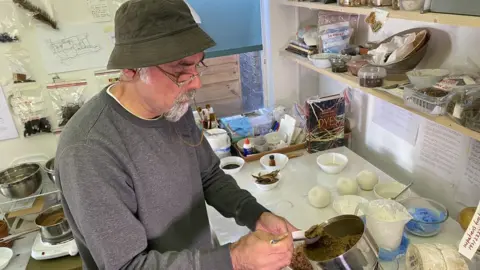 Louise Walsh/Cambridge University Botanic Garden Nabil Ali in his workshop