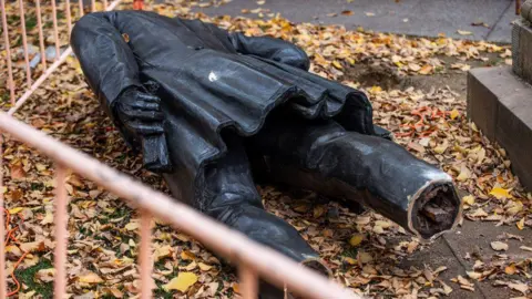 ABC News/Luke Bowden The fallen Crowther statue