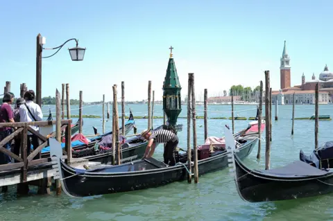 Getty Images A general view of Venice, Italy, during the wedding of Jeff Bezos and Lauren Sanchez. A number of gondolas are pictured on the water. 