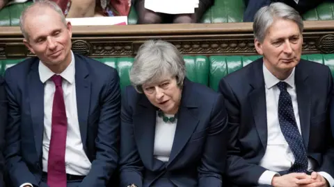 JESSICA TAYLOR/UK Parliament David Lidington, Theresa May, Philip Hammond
