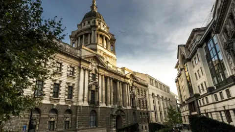 Getty Images The Central Criminal Court of England and Wales known as the Old Bailey from the street on which it stands.