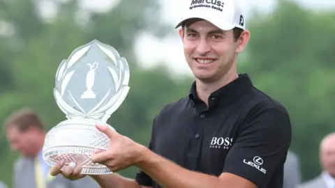 Patrick Cantlay poses with the trophy after winning the Memorial Tournament in 2021