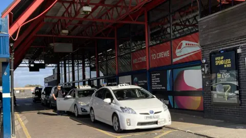 Taxis outside Crewe railway station