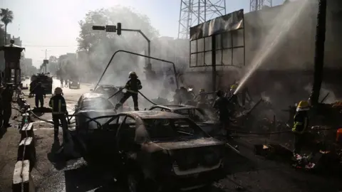 EPA Afghan police inspect the site of a blast in Jalalabad, Afghanistan, July 1, 2018