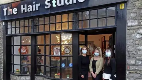 Facebook / Llantwit Major Jacquie and two of her team outside her shop