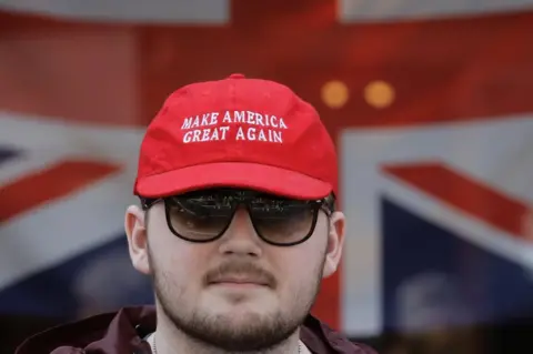 Reuters A pro Donald Trump supporter is seen outside Windsor Castle in Windsor