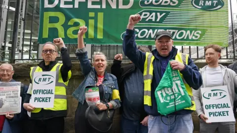 Andrew Milligan/ PA Media The picket line outside Edinburgh Waverley Station