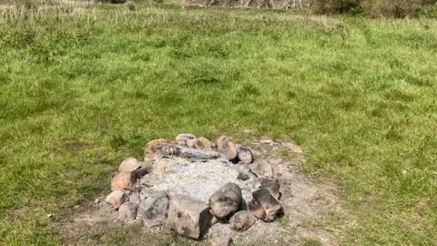 A burnt out campfire