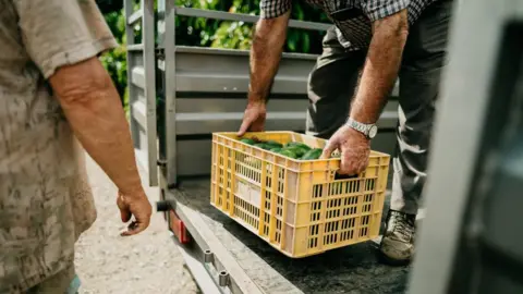 Getty Images Soaring fuel prices are making it more expensive to deliver food