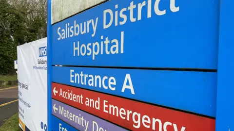 Salisbury District Hospital road sign directing people to Accident and Emergency.