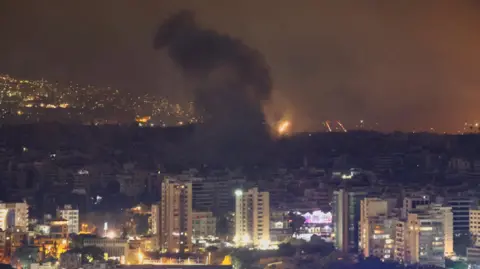 Reuters Smoke rises over the southern suburbs of Beirut after an attack, amid ongoing conflict between Hezbollah and Israeli forces, seen from Sin El Fil