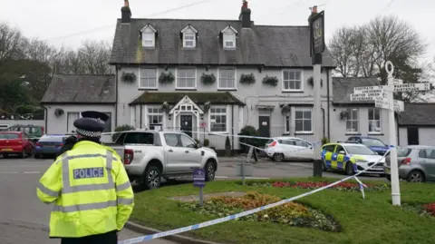 PA A police cordon outside the Three Horseshoes pub in Knockholt, Sevenoaks