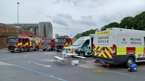 Fire engines and other vehicles at the scene