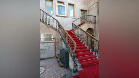 Calderdale Council Todmorden Town Hall, which features a red carpet staircase.