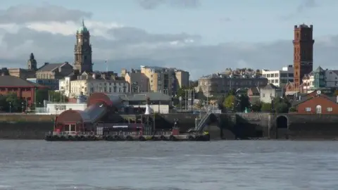 Geograph/Chris Allen Down on the water is the Woodside landing stage for the Mersey Ferry. The brick tower on the right is Hamilton Square Station on the electrified line that runs under the river to Liverpool.