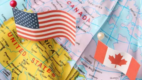 Getty Images Maps of the US and Canada with the national flags
