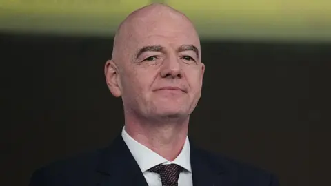 Gianni Infantino looks on during the Africa Cup of Nations last-16 match between South Africa and Cameroon 