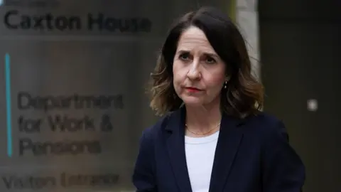 PA Media Work and Pensions Secretary Liz Kendall speaking to the media outside the Department for Work and Pensions in Westminster, London, after she announced that women affected by changes to the state pension age will not receive compensation