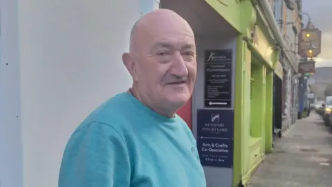 BBC Paddy Power co founder Stewart Kenny standing in the street