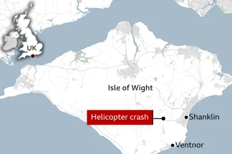 Hampshire and Isle of Wight Constabulary A graphic showing the map of the Isle of Wight with Ventnor and Shanklin marked by black dots and the crash site also marked with a black dot and highlighted red writing labelling it as helicopter crash