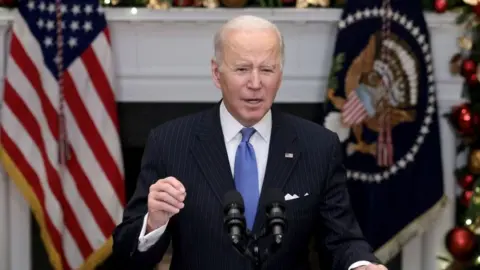 Getty Images Biden speaking at the White House