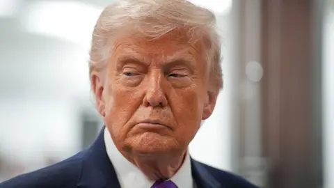 Trump attends a tour of a Thermo Fisher Scientific facility on 11 March, 2026 in Reading, Ohio