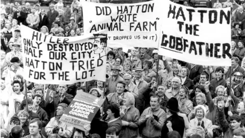 Getty Images Derek Hatton protests