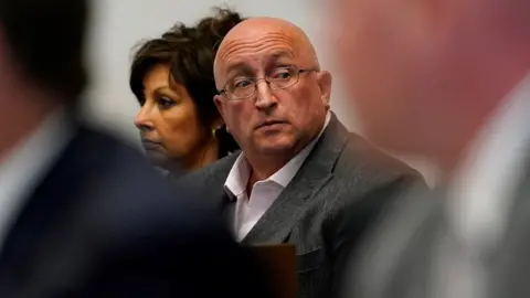 Reuters Robert Crimo Jr and Robert Crimo III's mother Denise Pesina at a hearing in August 2022