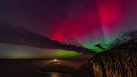 Northern Lights over South Stack lighthouse on Anglesey