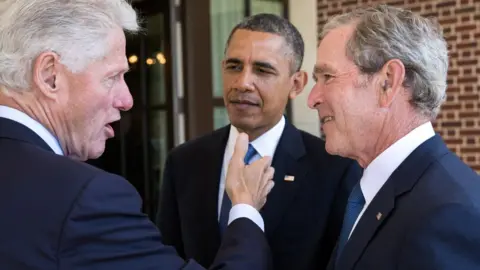 The White House Bill Clinton, Barack Obama and George W Bush in discussion at a event in April 2013