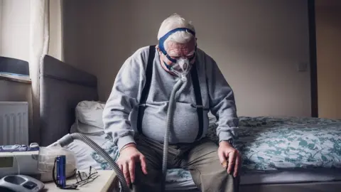 Getty Images A man wearing a nasal sleep mask