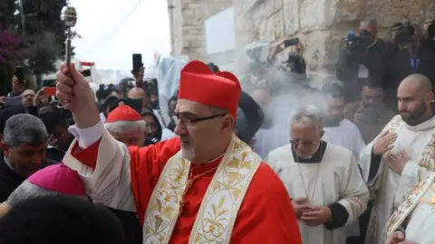 EPA The Latin Patriarch of Jerusalem in Bethlehem