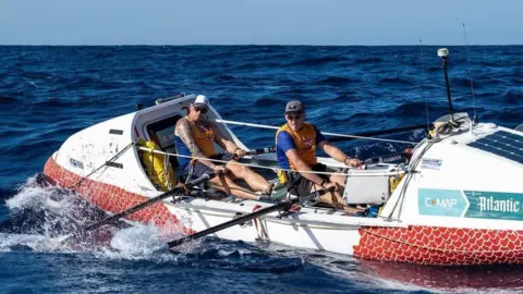 Atlantic Dragons Mr Bohin and Mr Tyrell rowing