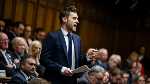 Dr Luke Evans MP (Hinckley and Bosworth, Conservative) during Prime Minister's Questions in the House of Commons, London. 14 January 2026