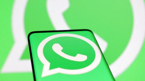 WhatsApp logo shown on mobile phone 