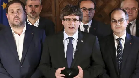 EPA Catalan leader Carles Puigdemont (C) and his cabinet giving a press statement on the independence referendum in Barcelona, Spain, 1 October 2017