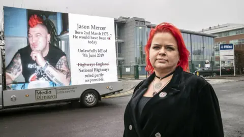 PA Media Claire Mercer outside police HQ with the advertising van