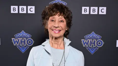 Jeff Spicer/Bad Wolf/BBC Studios A recent photo of Carole Ann Ford smiling at a BBC event marking the 60th anniversary of Doctor Who in 2023