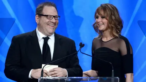 Getty Images Jennifer Lawrence with Harvey Weinstein at the GLAAD Media Awards in 2013