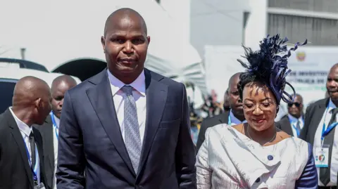 Daniel Chapo arrives at his inauguration with his wife  Gueta Chapo