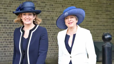 PA Amber Rudd and Theresa May
