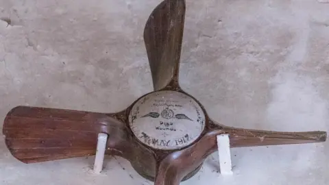 Bev Goodwin / Margaret Draycott Propeller cross at St Michael and All Angels, Alberbury