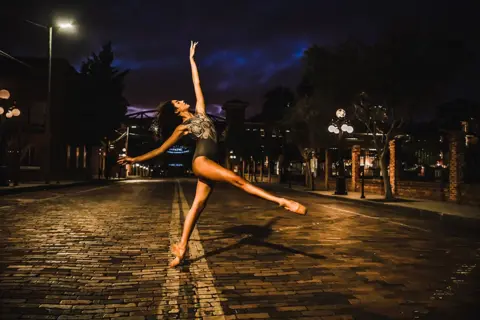 Amanda Van Meter Burch Dancer on a street at night