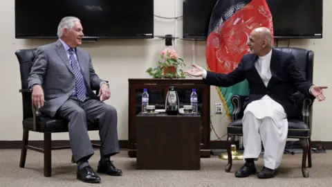 AFP/Getty Images The US Secretary of State and Afghanistan's President Ashraf Ghani.