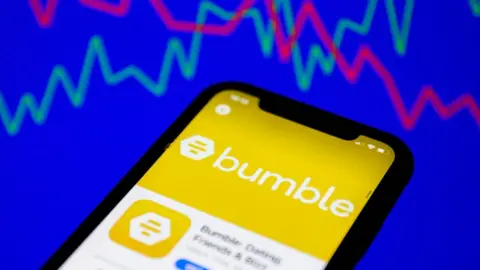 Getty Images Bumble on a phone