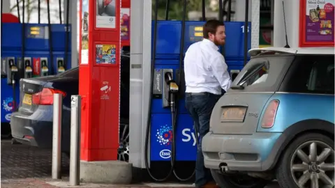 Getty Images Man at petrol station