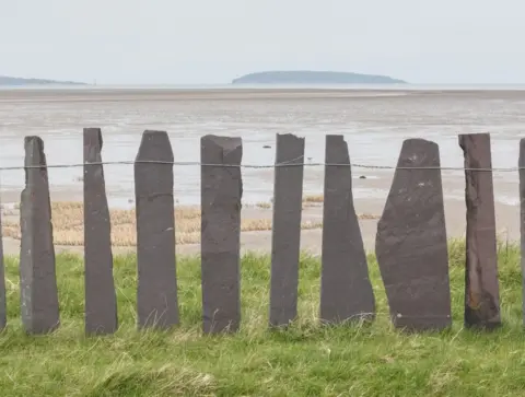 Quintin Lake Slate fence and Puffin Island, Lavan Sands, Gwynedd.
